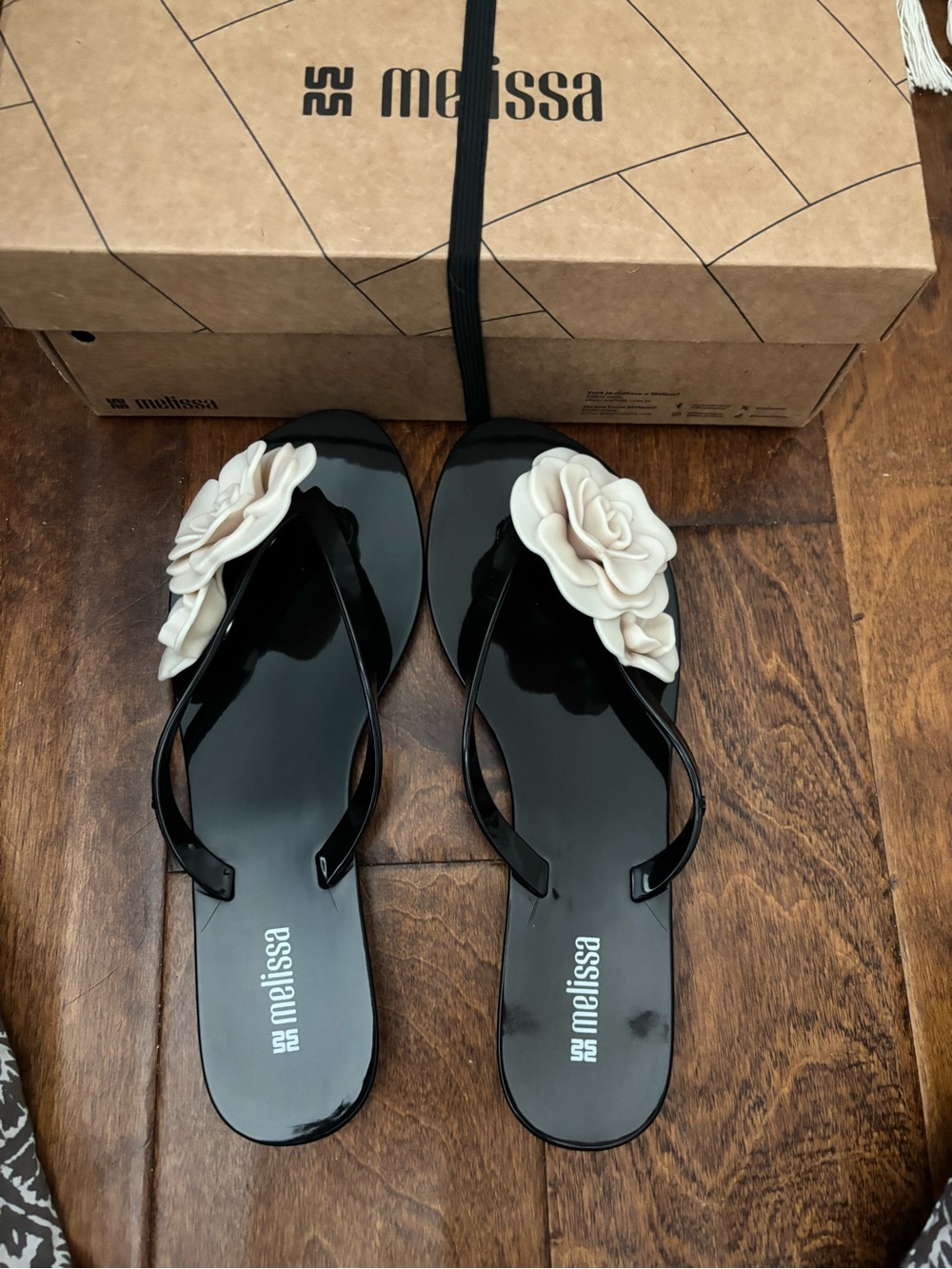 Free People Black Jelly Flip Sandals with Cream Flower